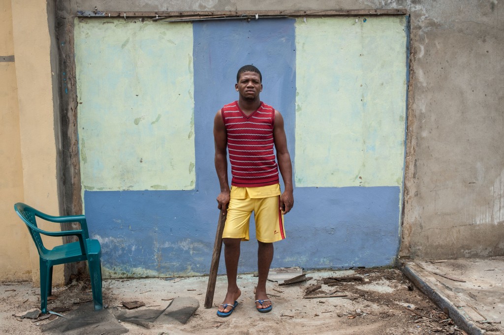 Biafran supporter Chinedu Iwu who got shot in the leg during a pro-Biafra protest in 2015 poses for a photo in Port Harcourt on May 3, 2016.   Over the past year Biafran independence protests have erupted across Nigeria's south-east where many protesters where injured or killed during clashes with the Nigerian Police and army. On December 23, 2015, the Federal Government of Nigeria charged political activist Nnamdi Kanu with treasonable felony in the Federal High court in Abuja, he stays in custody since his arrest in October 2015. / AFP / STEFAN HEUNIS