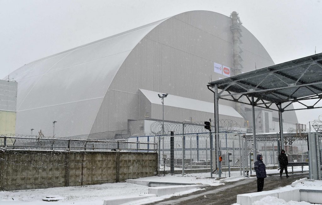 Inauguration sous la neige, mardi matin. (photo AFP)