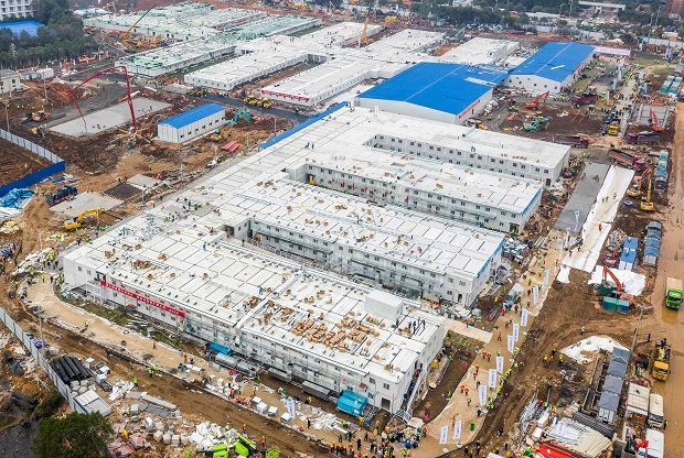 This aerial photo taken on February 2, 2020 shows the Huoshenshan hospital, which means "Fire God Mountain", after handed over to China's army in Wuhan in China's central Hubei province. - China's army on February 2 was given control of a nearly-finished field hospital that will treat patients at the epicentre of a deadly virus epidemic that has severely strained medical facilities. (Photo by STR / AFP) / China OUT