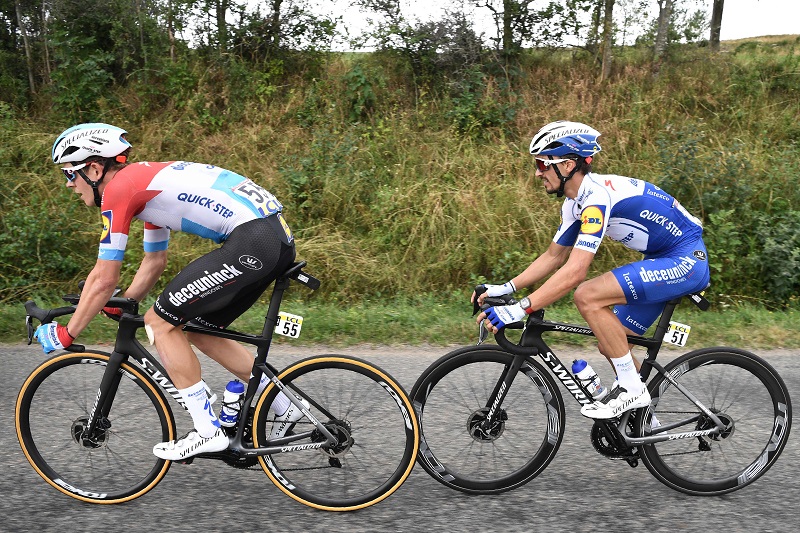 Team Deceuninck rider Luxemburg's Bob Jungels (L) and Team Deceuninck rider France's Julian Alaphilippe ride during the first stage of the 72nd edition of the Criterium du Dauphine cycling race, 218,5 km between Clermont-Ferrand and Saint-Christo-en-Jarez on August 12, 2020. (Photo by Anne-Christine POUJOULAT / AFP)